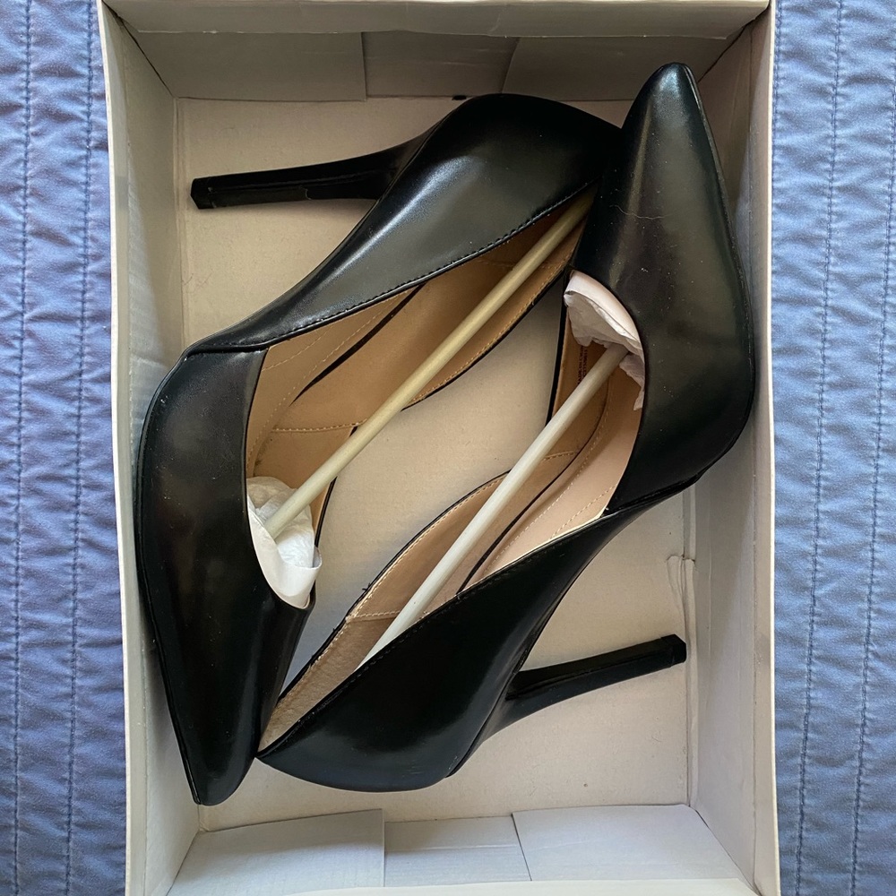 4” black stiletto heels. Never used.